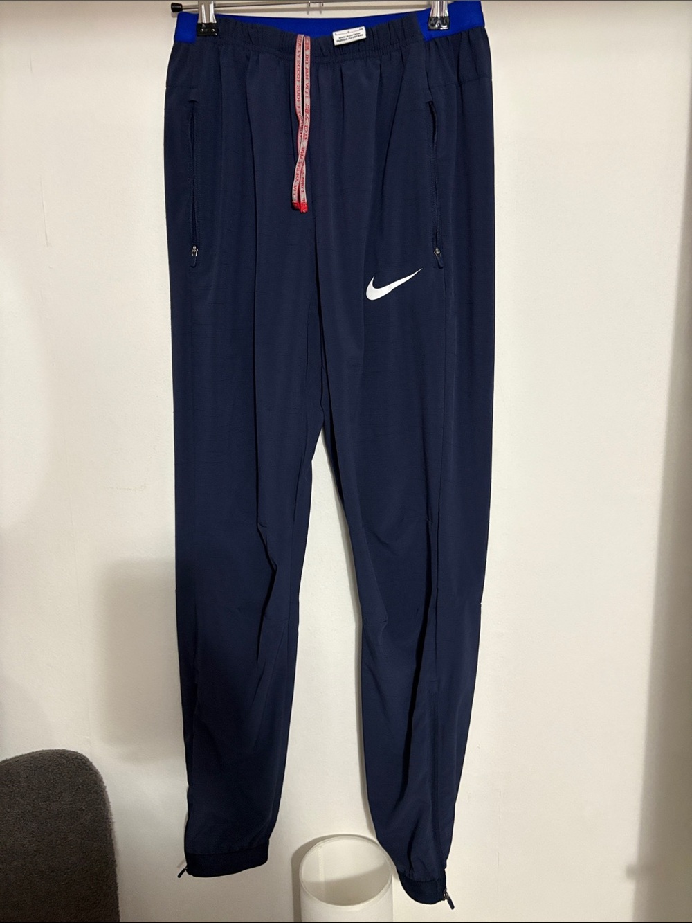 Nike Men’s navy Jogger Pants with white Swoosh and Red Drawstring
